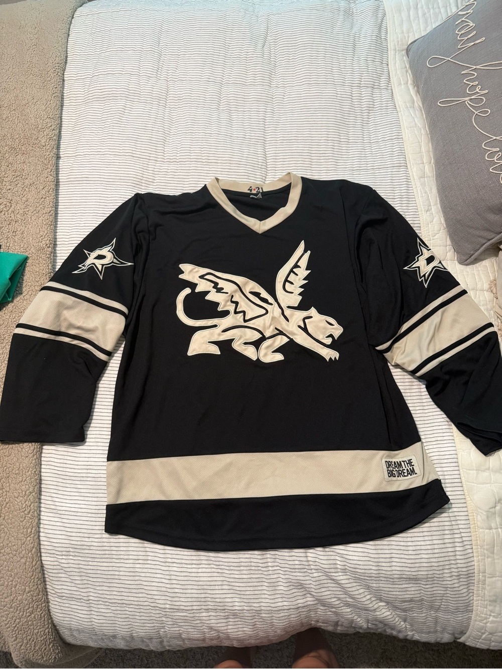 Black and Cream Winged Panther Hockey Jersey - Dream The Big Dream